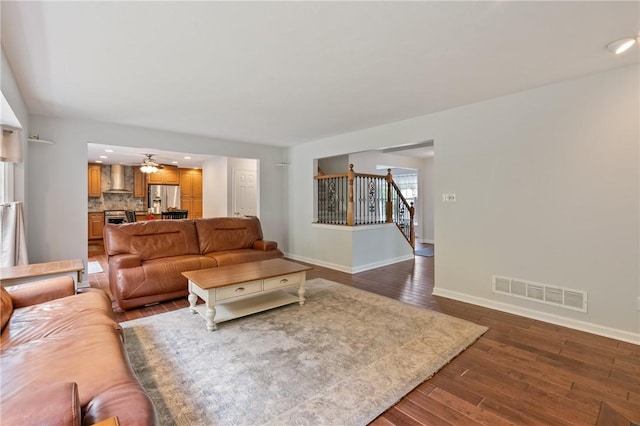 407 Pine Trees Dr, Scott Twp Sal, PA 15106 - living room featuring baseboards, dark wood finished floors, stairway, and a ceiling fan