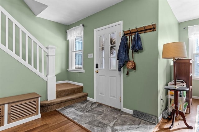 1241 Arkansas Ave, Dormont, PA 15216 - foyer featuring stairway, baseboards, and wood finished floors