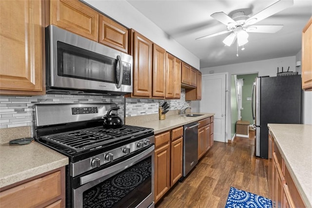 1241 Arkansas Ave, Dormont, PA 15216 - kitchen featuring appliances with stainless steel finishes, light countertops, and a sink