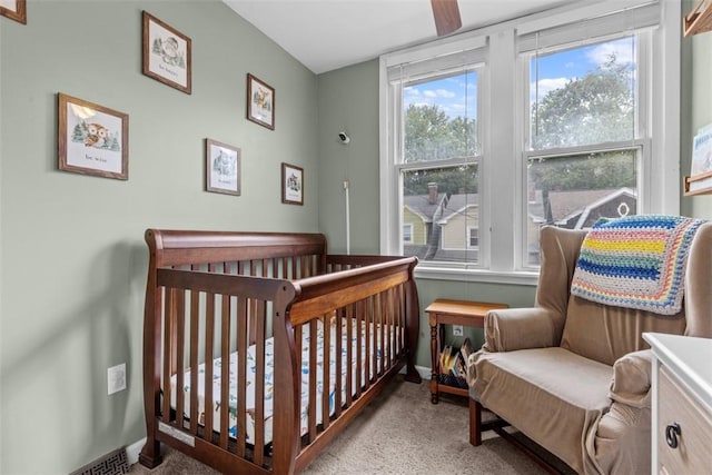 1241 Arkansas Ave, Dormont, PA 15216 - carpeted bedroom with a crib and baseboards