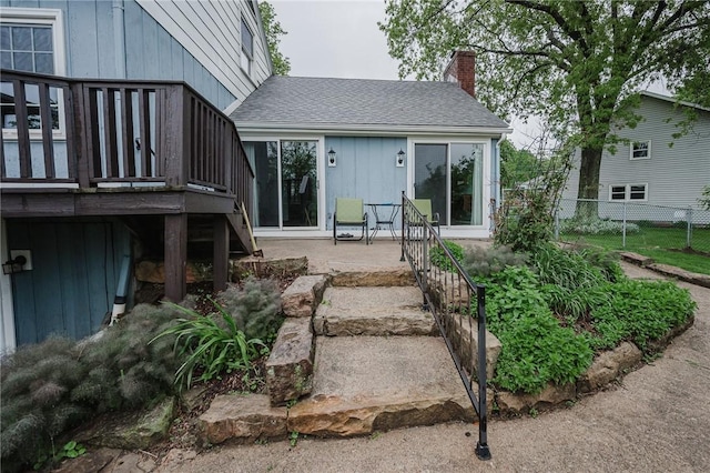 3 Coates Ln, White Twp Ind, PA 15701 - rear view of house featuring a chimney, roof with shingles, and a patio
