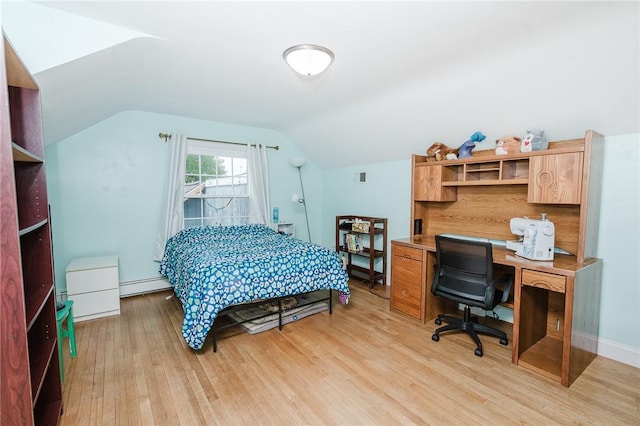 3 Coates Ln, White Twp Ind, PA 15701 - bedroom with a baseboard heating unit, light wood-style flooring, lofted ceiling, and an office area