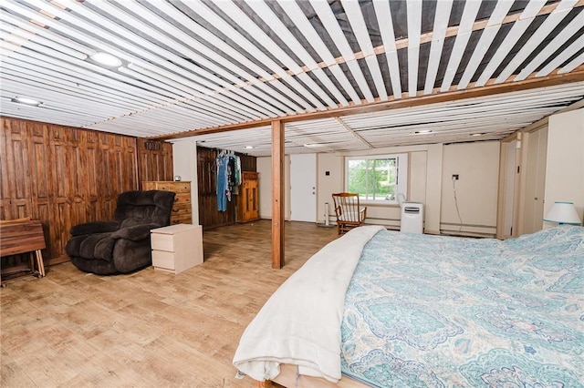 3 Coates Ln, White Twp Ind, PA 15701 - bedroom featuring wood finished floors and a baseboard heating unit