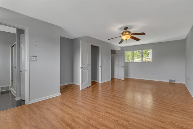 136 Upland Dr, Industry, PA 15052 - spare room with a ceiling fan, light wood finished floors, and baseboards