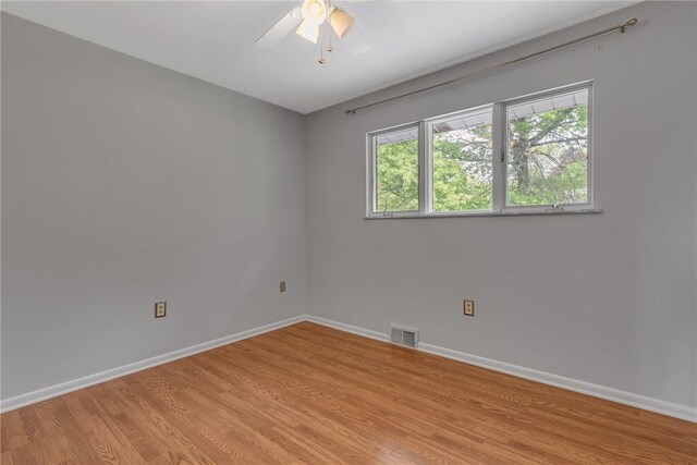 136 Upland Dr, Industry, PA 15052 - unfurnished room with baseboards, light wood finished floors, and ceiling fan