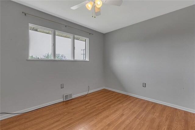 136 Upland Dr, Industry, PA 15052 - unfurnished room with light wood-type flooring, ceiling fan, and baseboards