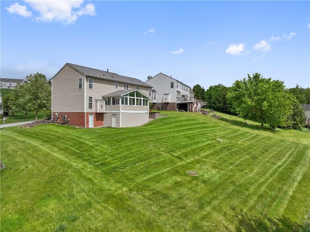5109 Forest Ridge Dr, South Fayette, PA 15057 - back of house with a yard and a sunroom