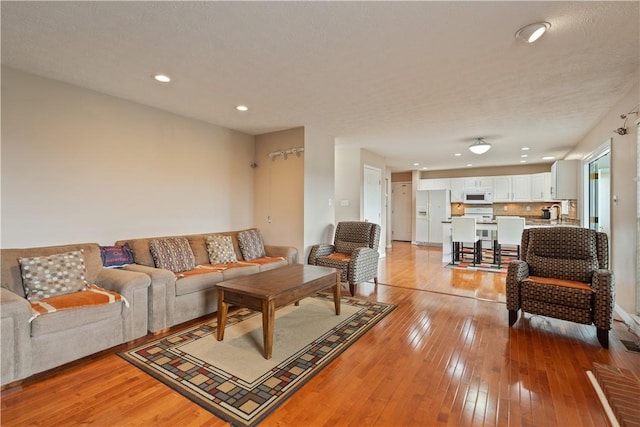 5109 Forest Ridge Dr, South Fayette, PA 15057 - living room with light wood-style flooring and recessed lighting