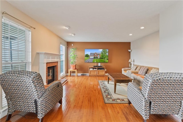 5109 Forest Ridge Dr, South Fayette, PA 15057 - living area featuring light wood-style floors, recessed lighting, and a fireplace