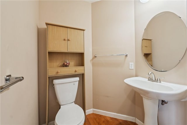 5109 Forest Ridge Dr, South Fayette, PA 15057 - bathroom featuring wood finished floors, toilet, and baseboards