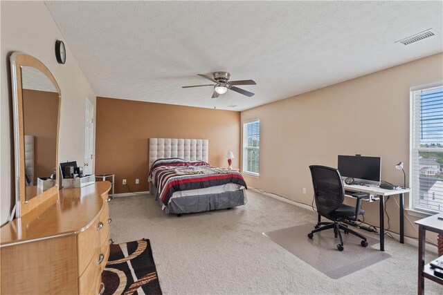 5109 Forest Ridge Dr, South Fayette, PA 15057 - carpeted bedroom featuring a desk, baseboards, a ceiling fan, and arched walkways