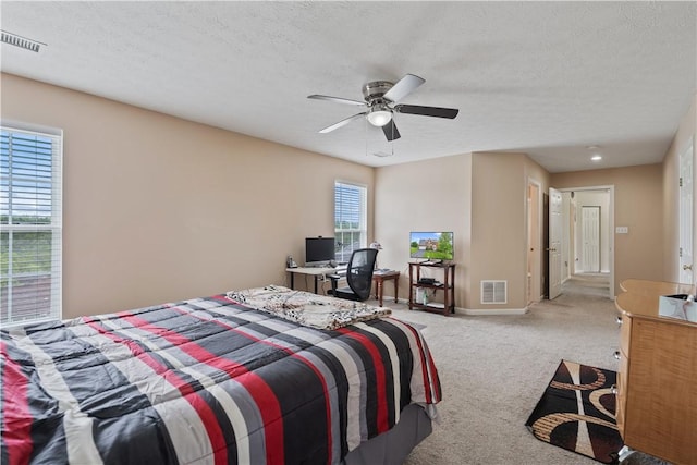 5109 Forest Ridge Dr, South Fayette, PA 15057 - carpeted bedroom with a textured ceiling, baseboards, and ceiling fan