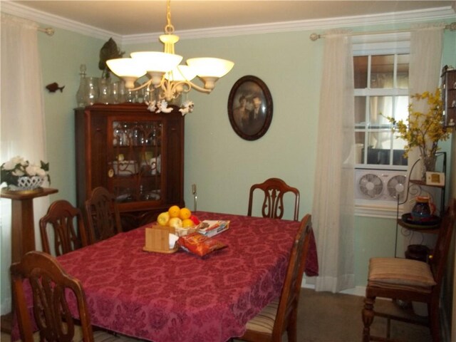 109 Mason Dr, Shaler, PA 15116 - carpeted dining space with a chandelier and crown molding