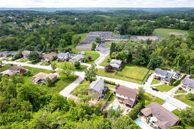 200 Sunrise Dr, Penn Twp Wml, PA 15642 - aerial perspective of suburban area featuring a heavily wooded area