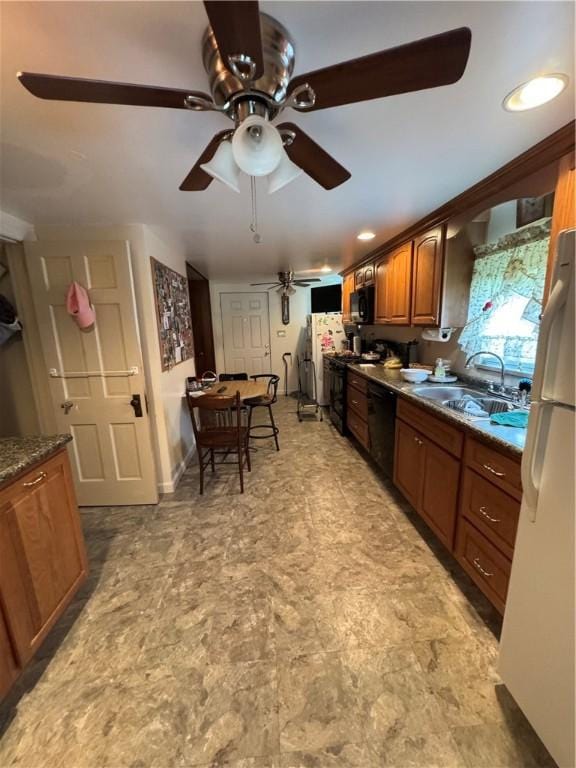 231 E Fairmont Ave, Trafford, PA 15085 - kitchen featuring a sink, black appliances, ceiling fan, and brown cabinets
