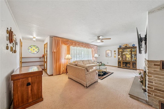 621 Kimlyn Ave, North Huntingdon, PA 15642 - living area featuring ceiling fan, light colored carpet, a textured ceiling, and crown molding