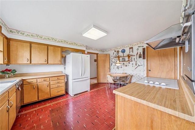 621 Kimlyn Ave, North Huntingdon, PA 15642 - kitchen with white appliances, wallpapered walls, light countertops, brown cabinetry, and exhaust hood