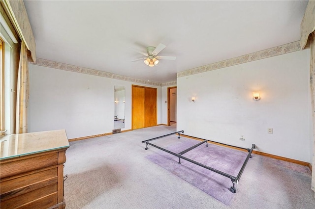 621 Kimlyn Ave, North Huntingdon, PA 15642 - unfurnished bedroom with baseboards, light colored carpet, and a closet