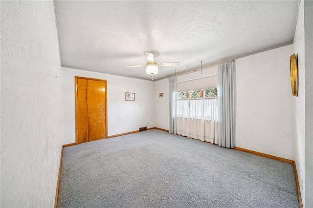 621 Kimlyn Ave, North Huntingdon, PA 15642 - empty room with carpet, ceiling fan, and baseboards