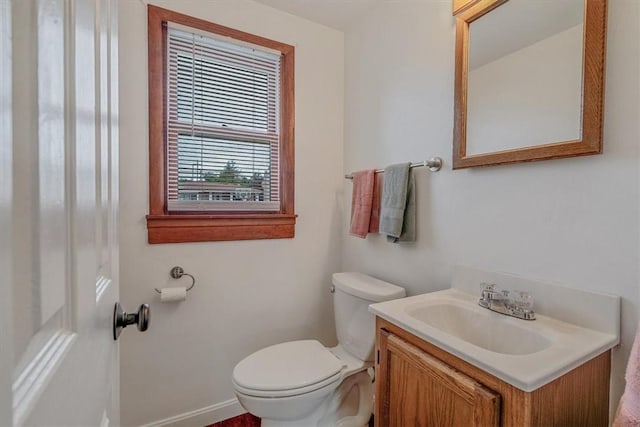 200 Spartan Dr, Bethel Park, PA 15102 - bathroom featuring toilet, vanity, and baseboards