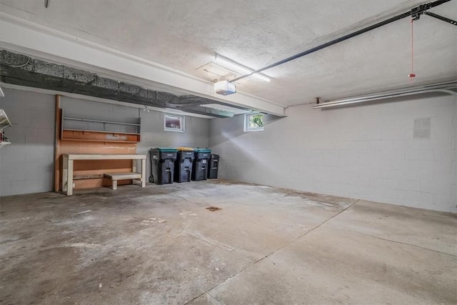 200 Spartan Dr, Bethel Park, PA 15102 - garage with a garage door opener and concrete block wall