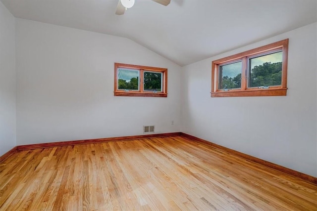 200 Spartan Dr, Bethel Park, PA 15102 - spare room featuring light wood finished floors, lofted ceiling, baseboards, and ceiling fan