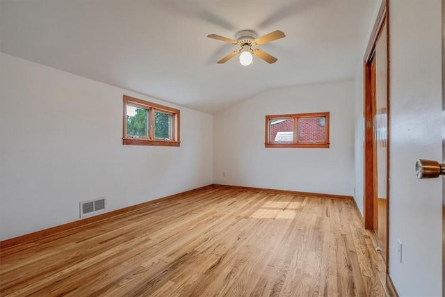 200 Spartan Dr, Bethel Park, PA 15102 - unfurnished room with light wood-style flooring, vaulted ceiling, ceiling fan, and baseboards