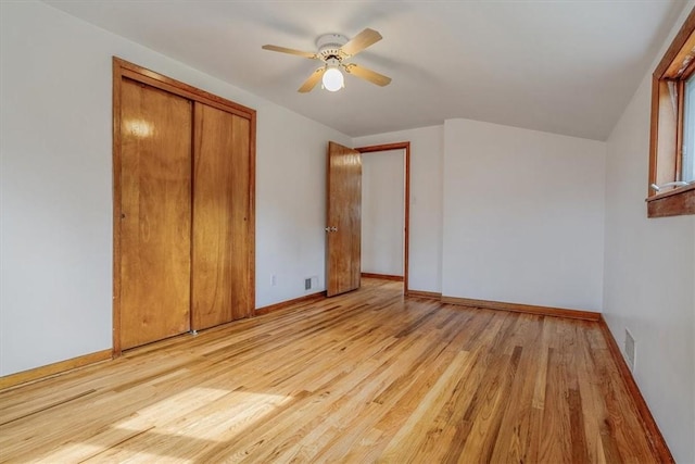 200 Spartan Dr, Bethel Park, PA 15102 - unfurnished bedroom with light wood-style flooring, a closet, baseboards, and ceiling fan