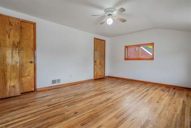 200 Spartan Dr, Bethel Park, PA 15102 - unfurnished bedroom with light wood-style flooring, vaulted ceiling, baseboards, and ceiling fan