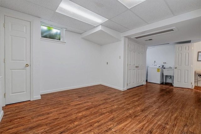 200 Spartan Dr, Bethel Park, PA 15102 - finished below grade area featuring washer / clothes dryer, wood finished floors, baseboards, and a sink