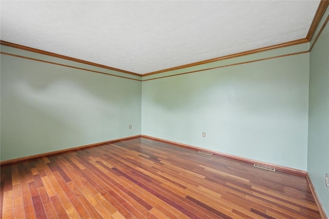 5020 Meadow Crest Dr, Hampton, PA 15101 - empty room featuring baseboards, hardwood / wood-style flooring, and ornamental molding
