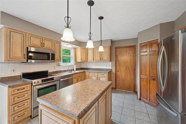 5020 Meadow Crest Dr, Hampton, PA 15101 - kitchen featuring appliances with stainless steel finishes, tasteful backsplash, a kitchen island, a sink, and hanging light fixtures