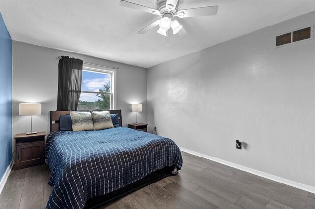 65 Universal St, Bridgeville, PA 15017 - bedroom featuring wood finished floors, baseboards, and a ceiling fan