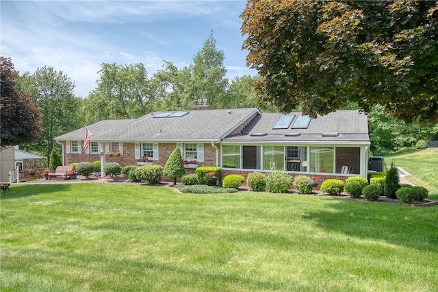 117 Glenfield Dr, Brighton Twp, PA 15009 - back of house with a lawn, brick siding, and a patio area