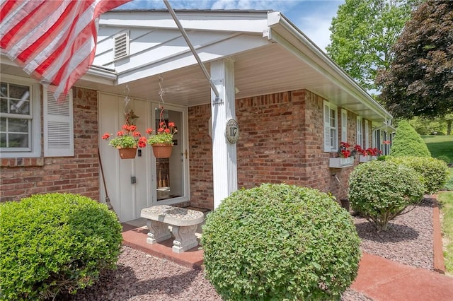 117 Glenfield Dr, Brighton Twp, PA 15009 - view of exterior entry with brick siding and covered porch