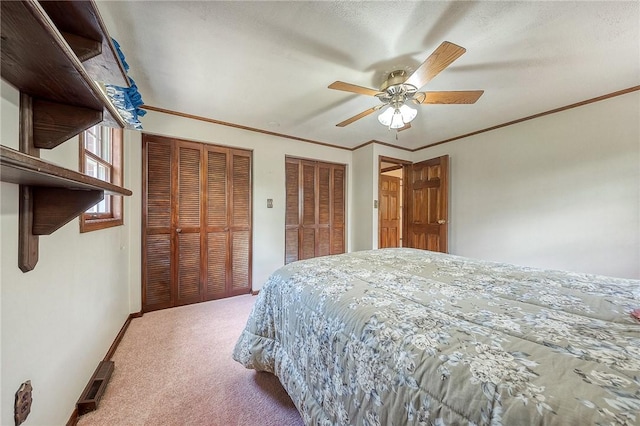 117 Glenfield Dr, Brighton Twp, PA 15009 - carpeted bedroom with multiple closets, a ceiling fan, crown molding, and baseboards