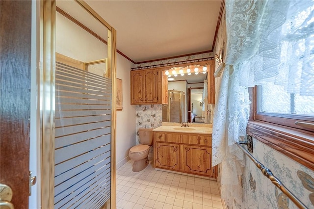 117 Glenfield Dr, Brighton Twp, PA 15009 - full bath featuring ornamental molding, vanity, tile patterned flooring, toilet, and a shower with door