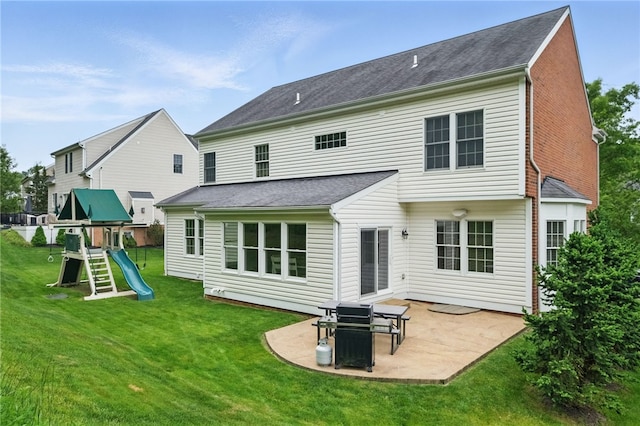 509 Rockport Pl, Marshall, PA 15090 - rear view of house featuring a patio area, a lawn, and a playground