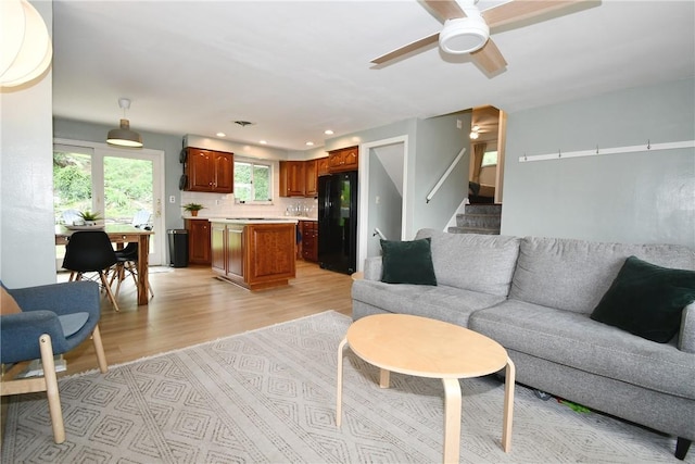 303 Larch Ln, Baldwin Twp, PA 15234 - living area with light wood-style flooring, stairs, ceiling fan, and recessed lighting