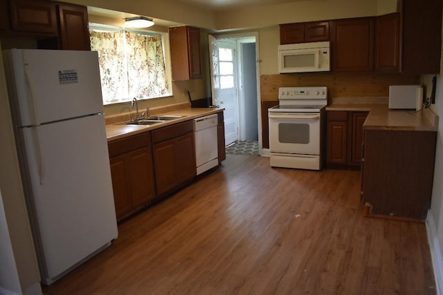 945 Brodhead Rd, Moon/Crescent Twp, PA 15108 - kitchen with white appliances, light wood-style flooring, and light countertops