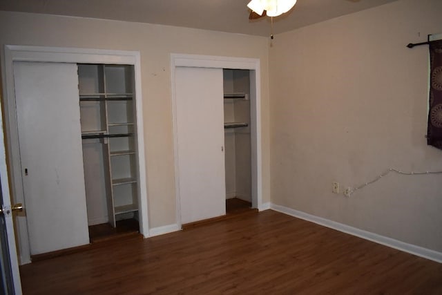 945 Brodhead Rd, Moon/Crescent Twp, PA 15108 - unfurnished bedroom with two closets and wood finished floors