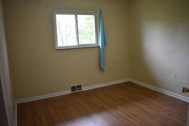 945 Brodhead Rd, Moon/Crescent Twp, PA 15108 - empty room featuring wood finished floors and baseboards