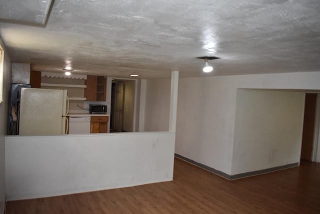 945 Brodhead Rd, Moon/Crescent Twp, PA 15108 - kitchen with white appliances, wood finished floors, and a peninsula