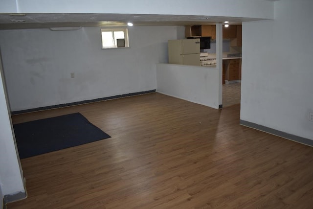 945 Brodhead Rd, Moon/Crescent Twp, PA 15108 - below grade area featuring freestanding refrigerator and wood finished floors
