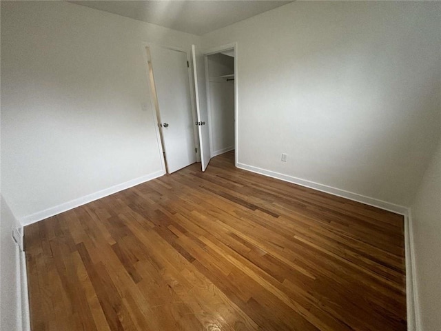 1123 Blue Jay Dr, Pittsburgh, PA 15243 - unfurnished bedroom with wood finished floors, baseboards, and a closet