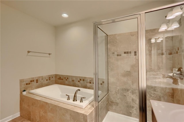 309 Trafalgar Sq, Cranberry Twp, PA 16066 - bathroom featuring a bath, a stall shower, and recessed lighting