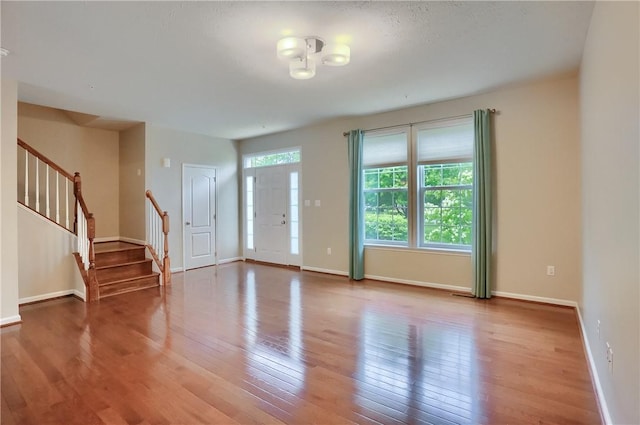 309 Trafalgar Sq, Cranberry Twp, PA 16066 - foyer featuring wood finished floors, stairway, and baseboards
