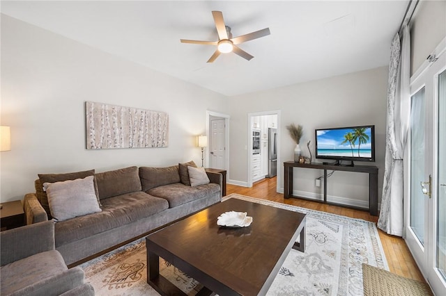 230 Summerlawn Dr, Bell Acres, PA 15143 - living area featuring a ceiling fan, wood finished floors, and baseboards