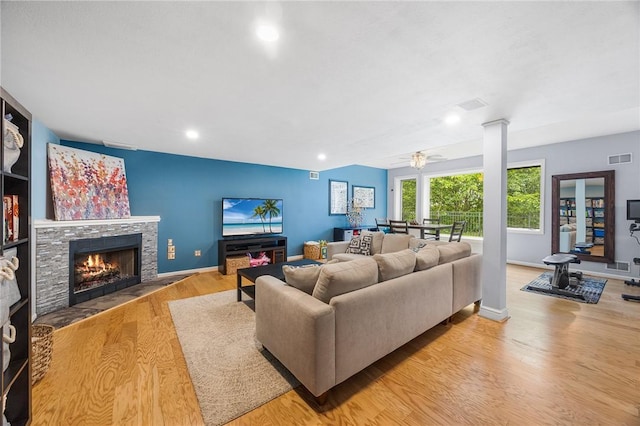 230 Summerlawn Dr, Bell Acres, PA 15143 - living area with wood finished floors, a ceiling fan, a stone fireplace, recessed lighting, and baseboards