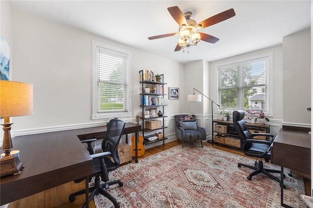 230 Summerlawn Dr, Bell Acres, PA 15143 - home office with plenty of natural light, wood finished floors, a ceiling fan, and wainscoting